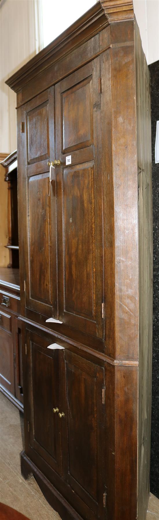 A late 18th century oak standing corner cupboard, width 3ft height 6ft 8in.